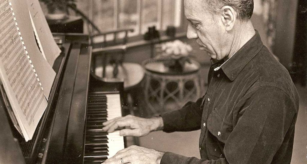 Robert Dix playing piano (black & white)